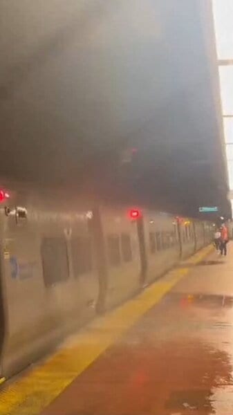 Wild video shows floodwaters pouring over Metro-North train at Grand Central 1 Metro-North train flood