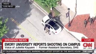 PHOTO: A white car parked outside the CVS was searched by police