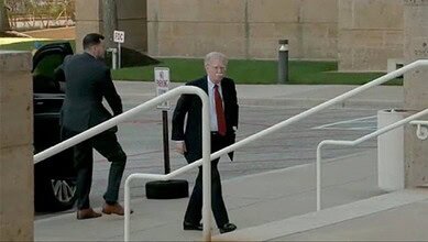 Photo: John Bolton arrives at court