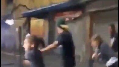 Video: Civilians are seen running for cover amid heave gunfire on the streets of Caracas