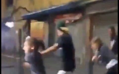 Video: Civilians are seen running for cover amid heave gunfire on the streets of Caracas