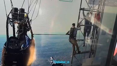 Video: Two trapped nearly 1,000 feet after hot air balloon hits communication tower in Texas