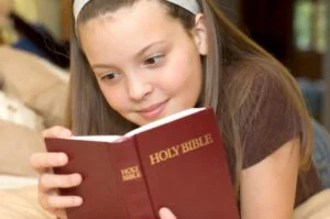 Girl reading her Bible