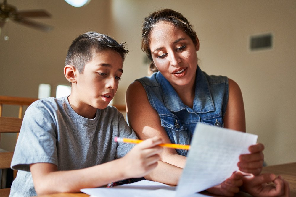 mother and son learning hebrew together