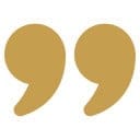 Gold decorative quotation marks icon.
