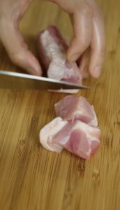 Cut pork belly into cubes
