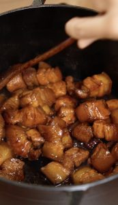 stir and simmer the pork