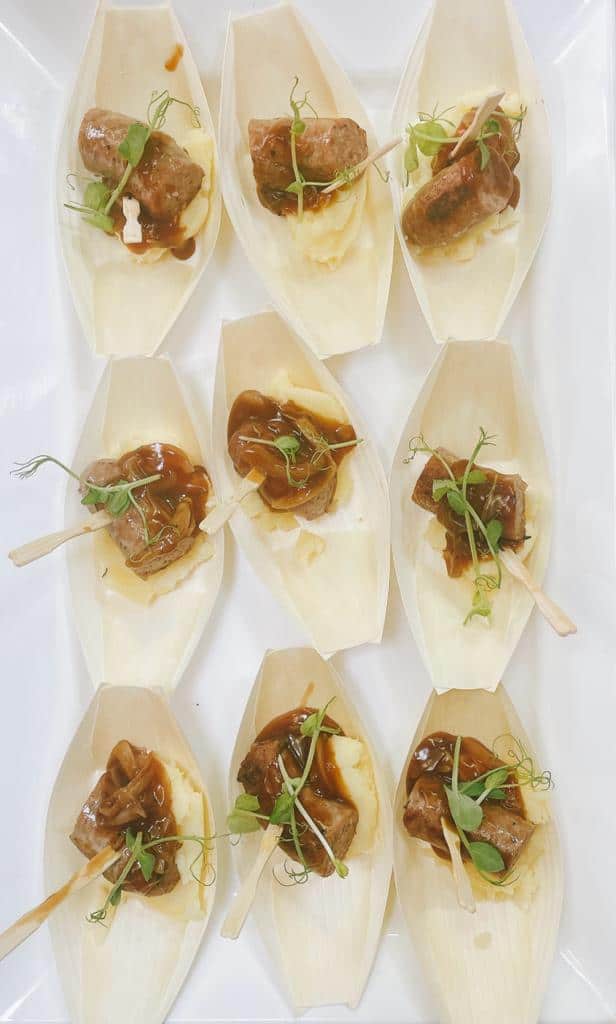 Delicious gourmet meat bites served on edible spoons.