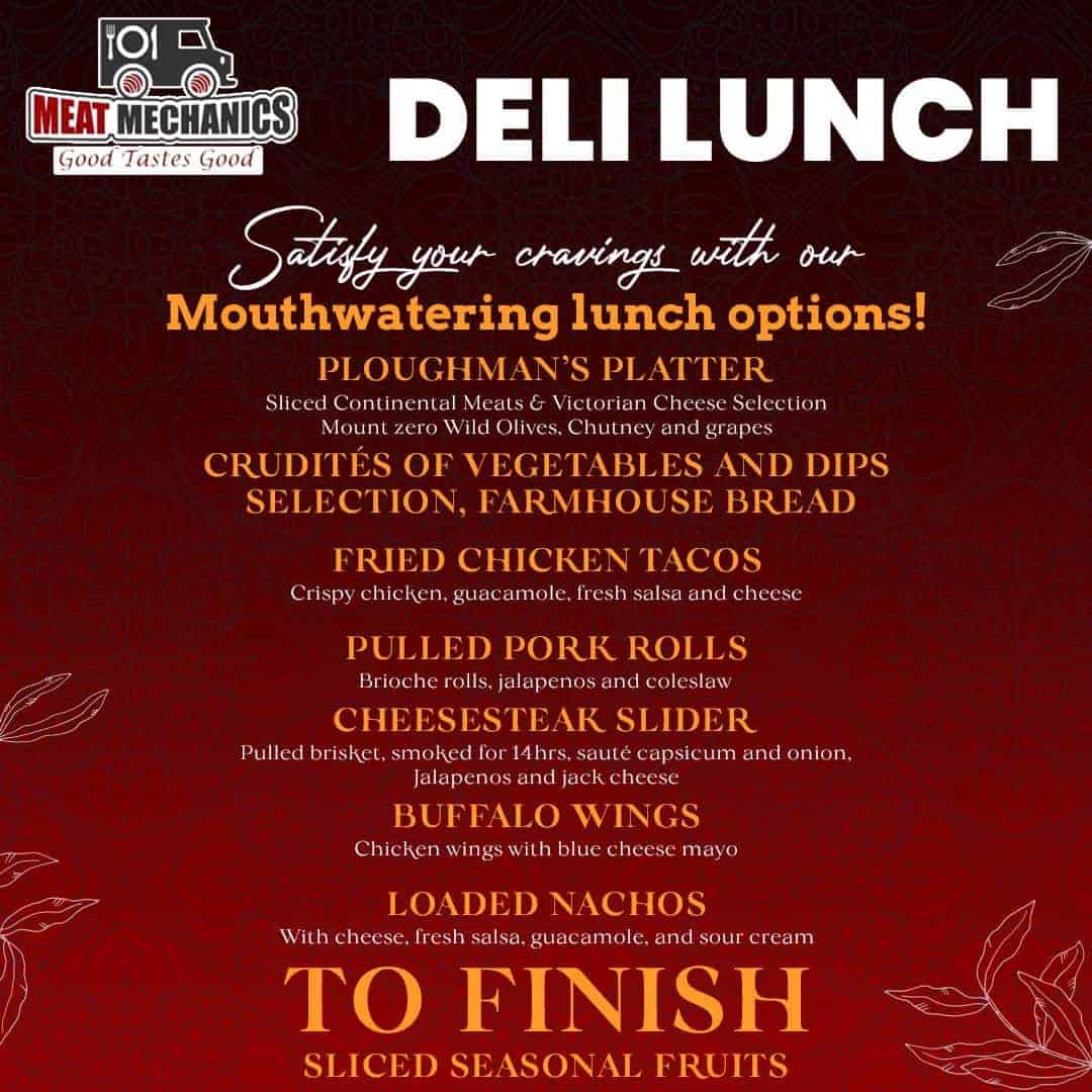 Deli lunch menu featuring sandwiches, wings, nachos, and seasonal fruits.