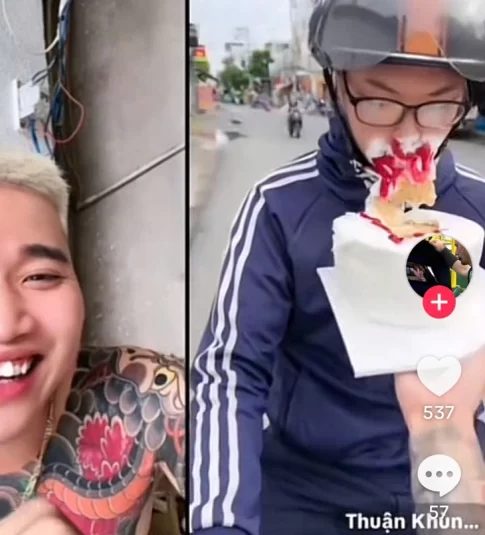 信号待ちのバイクドライバーの顔にケーキを押し付ける