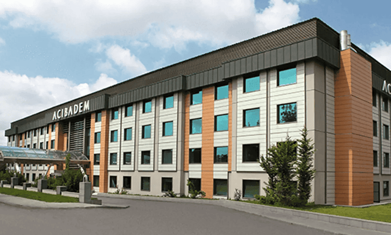 Acibadem Hospitals Group building exterior, showcasing modern healthcare facility in a professional.