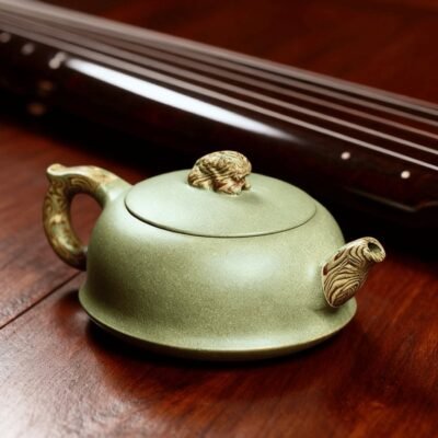 ball filter teapot with mythical beast design