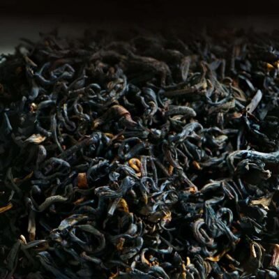 Keemun black tea, hand-rolled spiral tea from Huangshan. Rich aroma, smooth taste, health benefits. Free shipping worldwide.