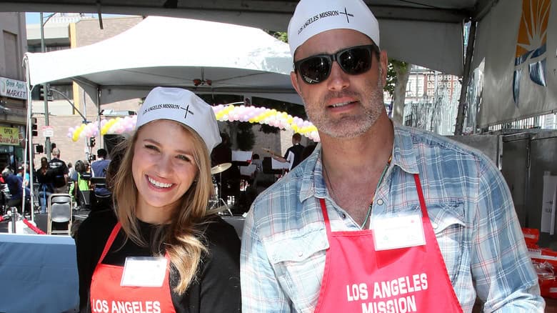 Shantel VanSanten and Victor Webster volunteering together for Los Angeles Mission.