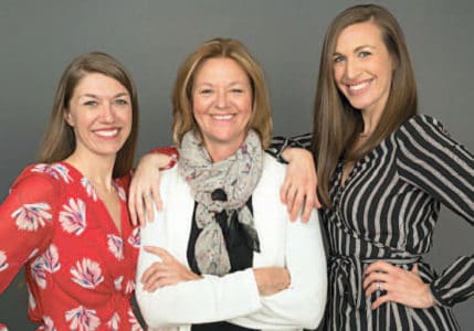 Trudy Lawler, President of the Michaud Agency and her daughters