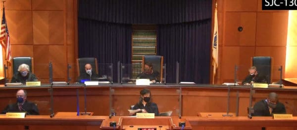 Full bench of he Supreme Judicial Court hearing argument