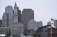 Boston skyline representing Massachusetts economic growth