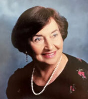Picture of the deceased, Antoinette Borilli with pearl necklace