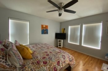 Blackout roller shades installation in denver co bedroom