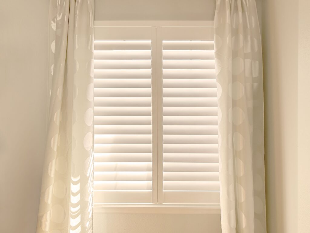 Hunter Douglas Palm Beach Polysatin Shutters with Hidden Tilt and Z Frame Installed by AIM