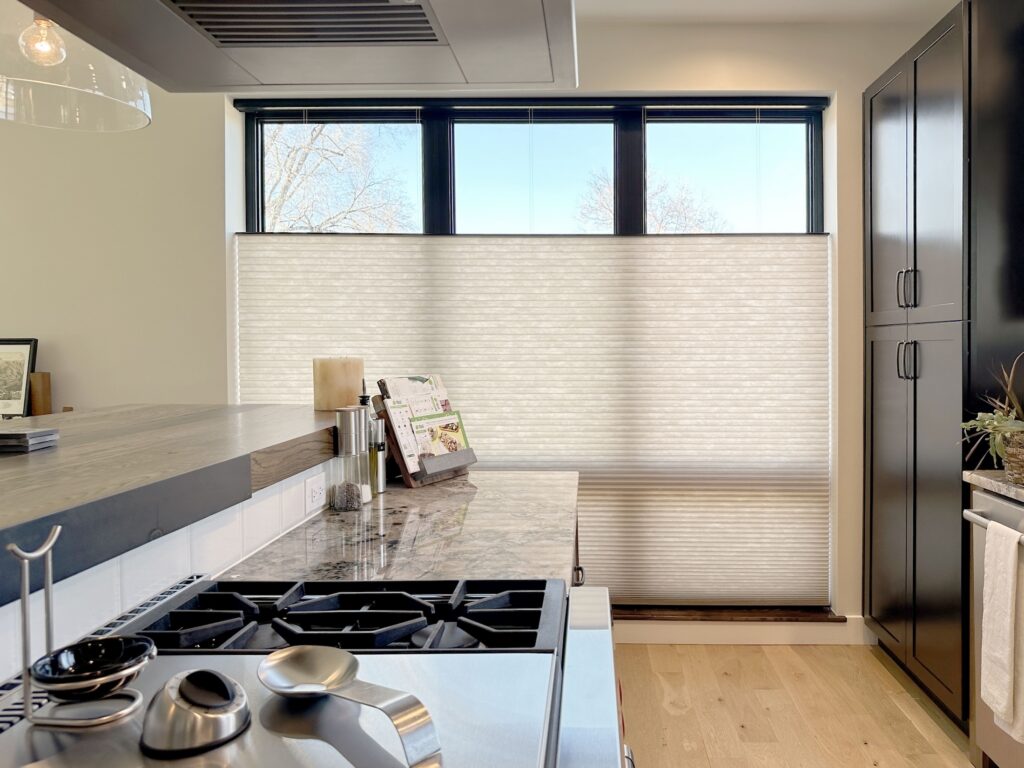 Hunter Douglas Applause Cellular Shades with PowerView Automation and Top-Down Bottom-Up installed in Colorado kitchen
