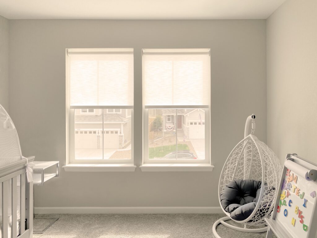 Hunter Douglas Designer Roller Shades with Custom Clutch and Light Filtering Fabric for nursey room in Colorado home