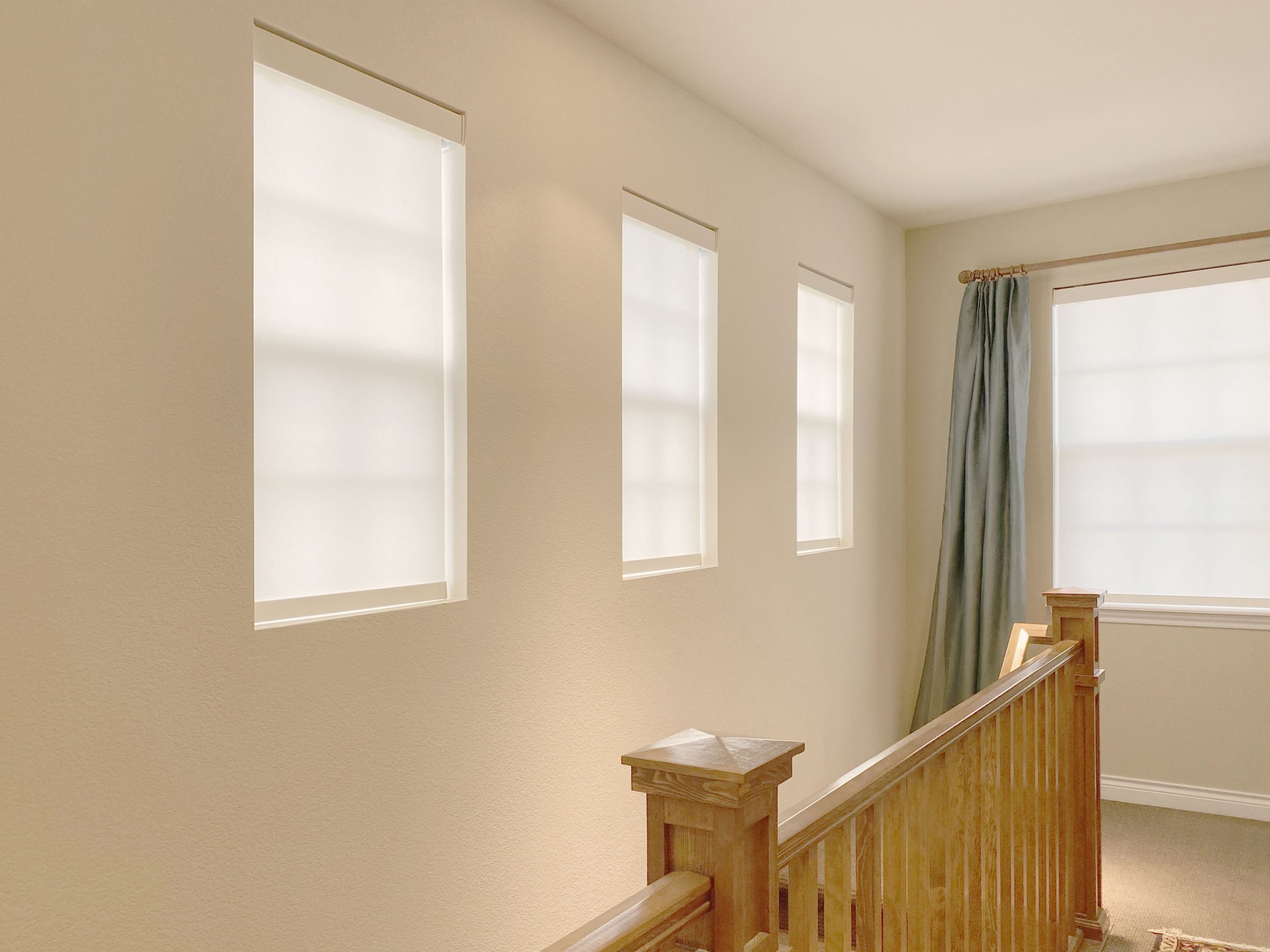 Hunter Douglas motorized and automated window treatments in a Littleton home with smart home integration