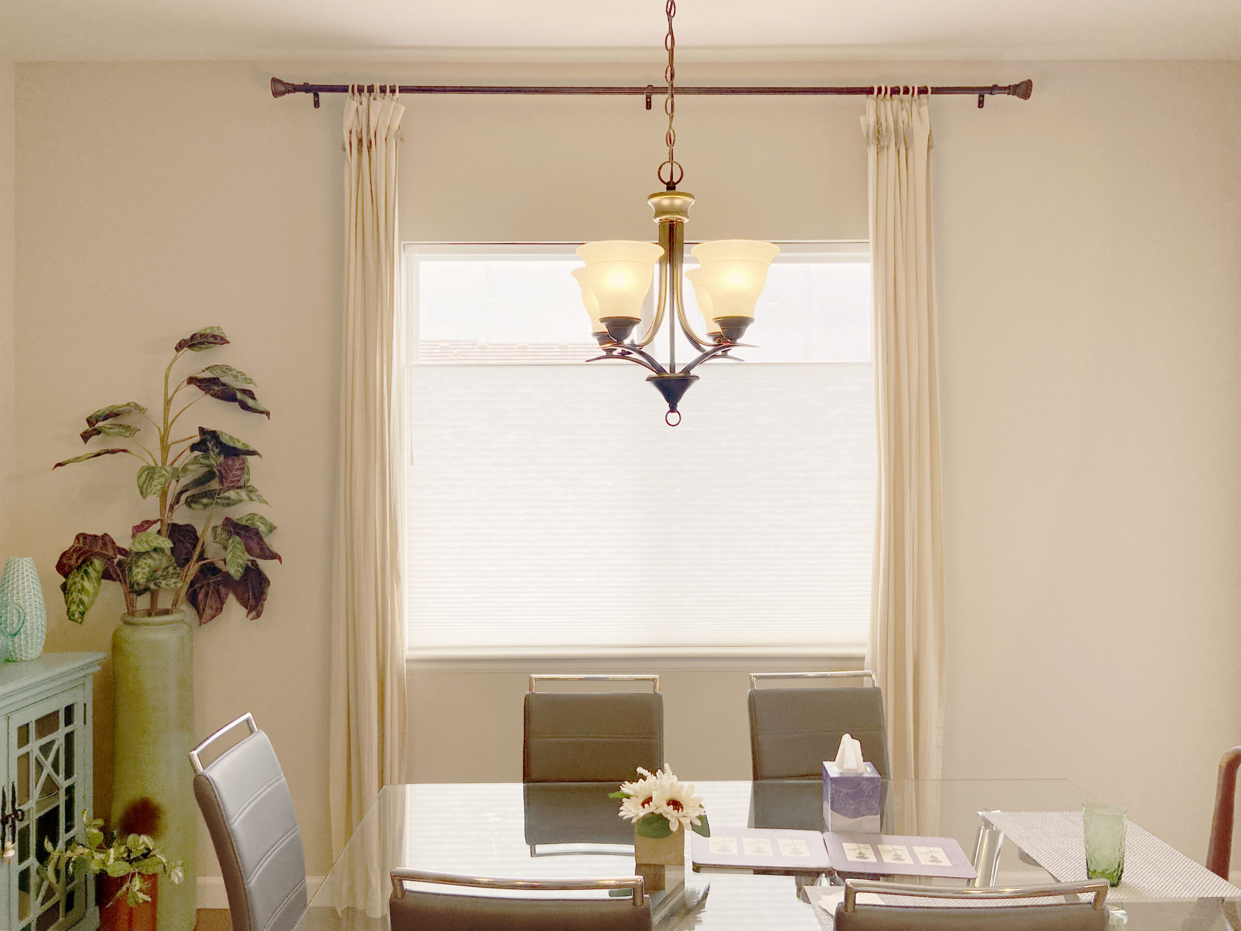 Hunter Douglas Applause Cellular Shades with Ultraglide Top-Down Bottom-Up, Applause Vertiglide with Vertical operation, and Palm Beach Polysatin Shutters with Hidden Tilt and Z Frame, all in light-filtering materials.