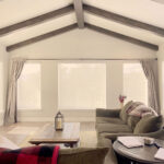 Hunter Douglas Designer Screen Shades with PowerView automation, Bottom Up operation, and light-filtering screen fabric.