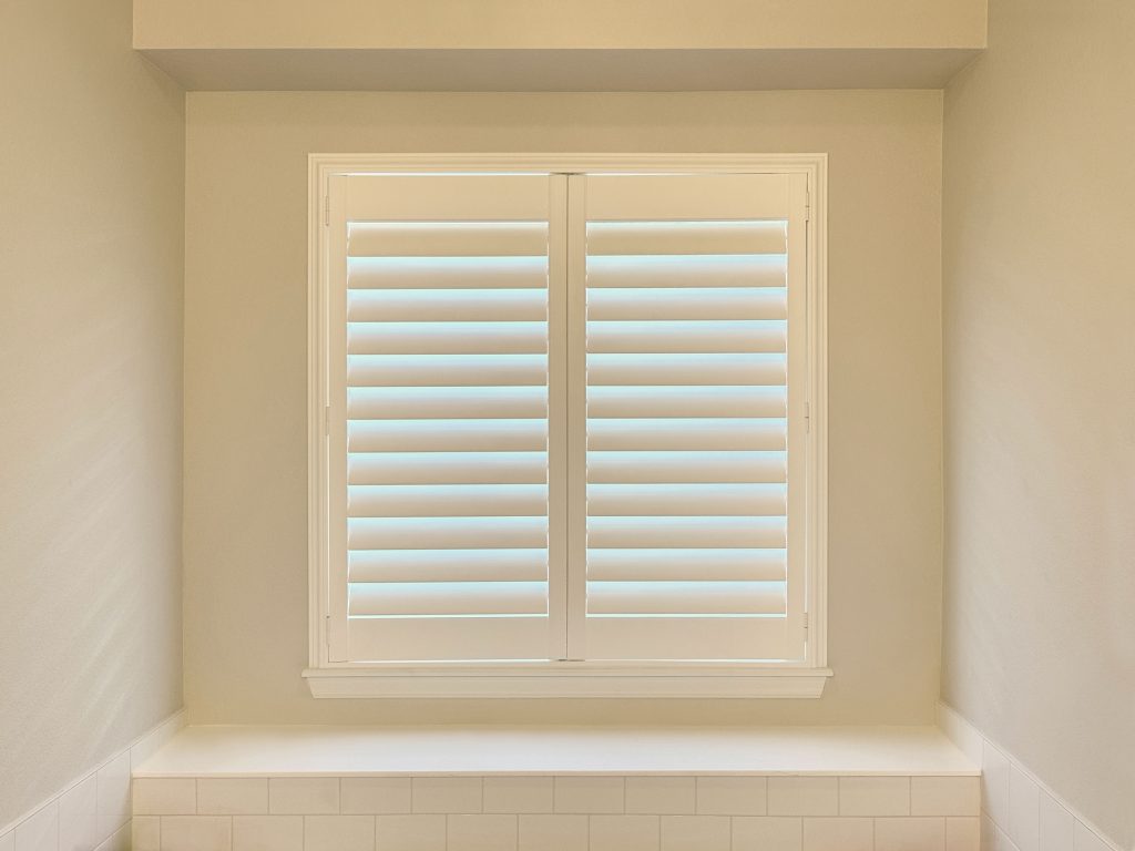 Hunter Douglas Palm Beach Polysatin Shutters with Front Center Tilt and Z Frame installation in Boulder homes