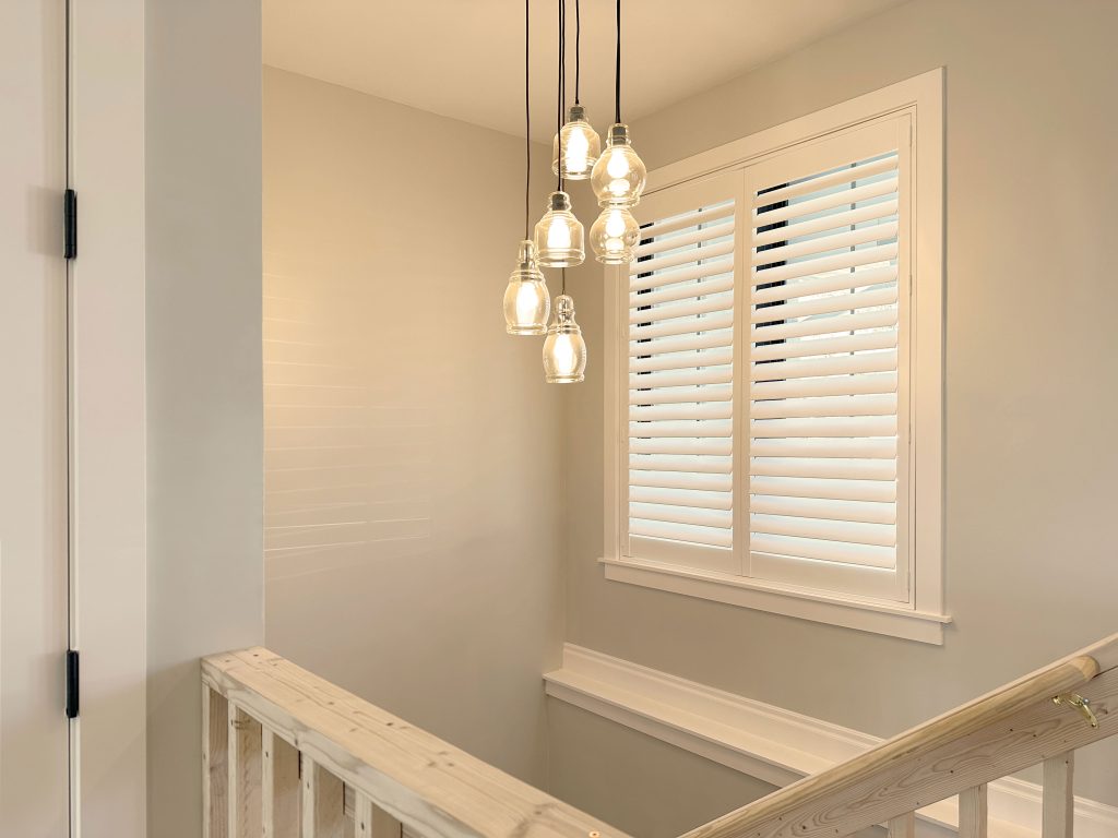 Hunter Douglas Palm Beach Polysatin Shutters with PowerView automation and L Frame installation in Boulder homes