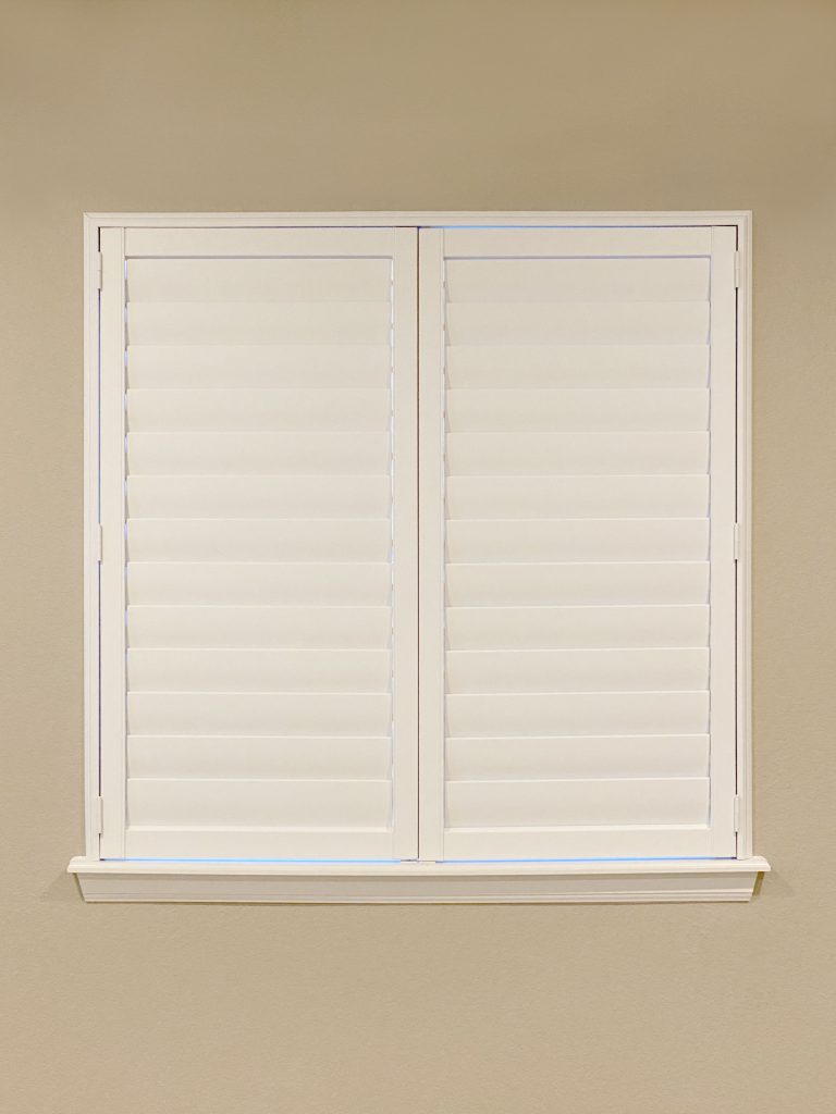 Hunter Douglas Palm Beach Polysatin Shutters with Hidden Tilt louvers and Z Frame installation in Boulder homes