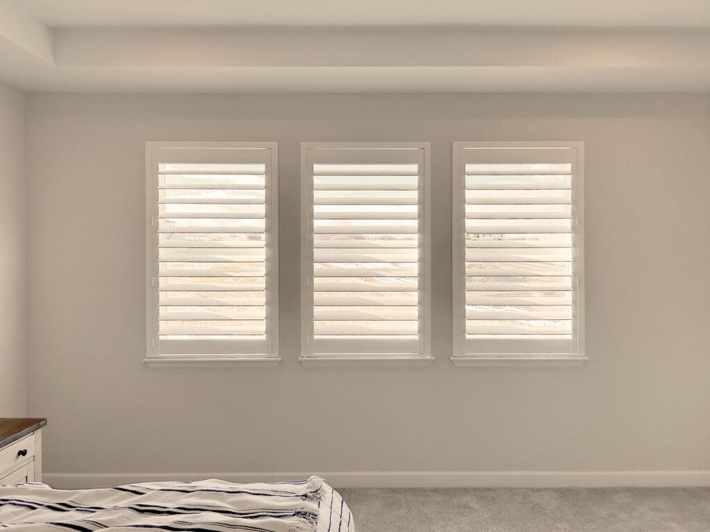 Hunter Douglas Custom Palm Beach Polysatin Shutters with Hidden Tilt and Z Frame for Colorado bedroom