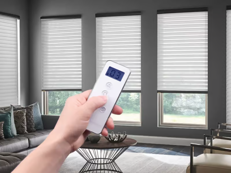 Hunter Douglas Designer Roller Shades and Applause Cellular Shades with PowerView automation, Bottom Up and Top-Down Bottom-Up operation, and light-filtering and room-darkening fabric options.