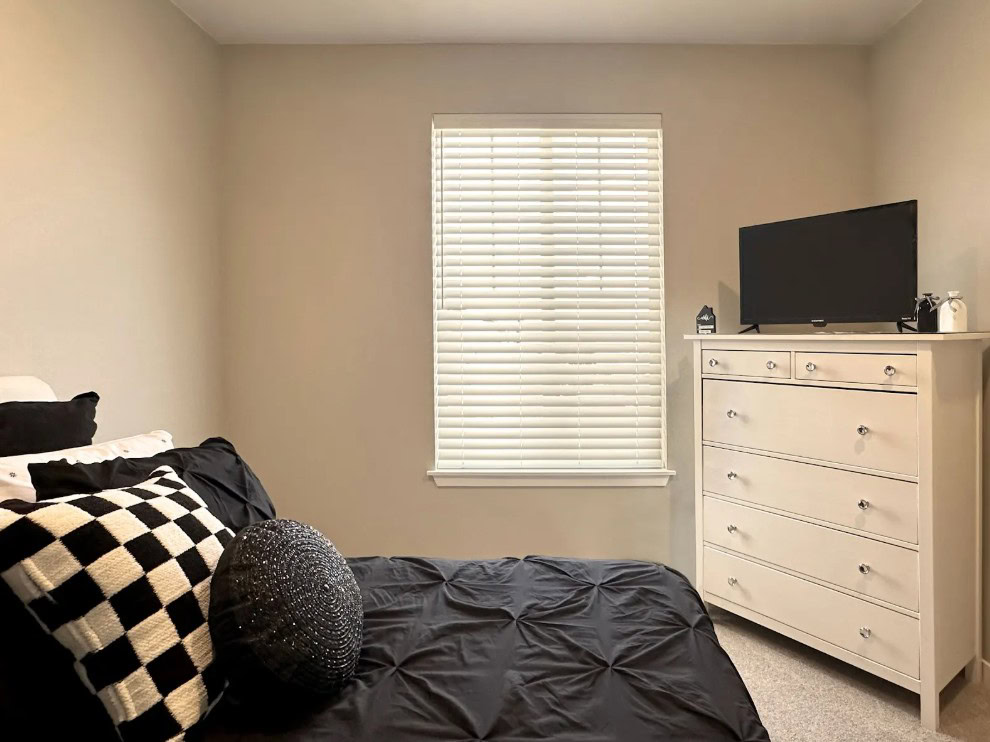 Alta Cordless Blinds in the modern Aurora color, featuring a safe and convenient cordless lift mechanism for easy adjustment.