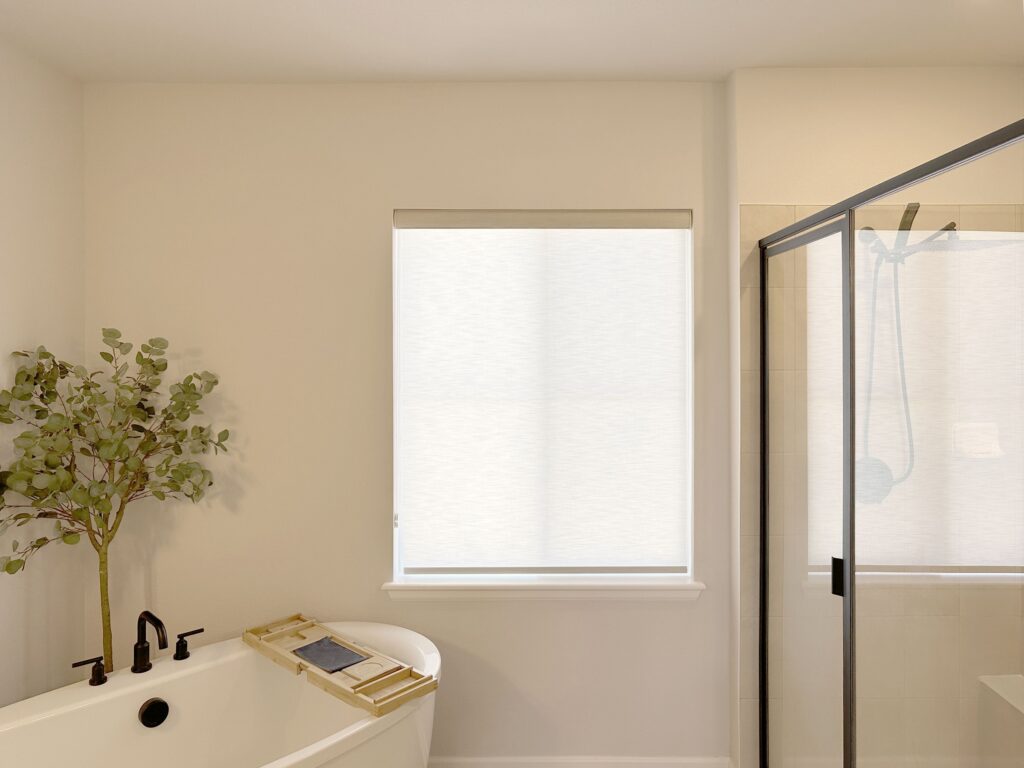 Alta Roller Shades with Light Filtering fabric and Custom Clutch operating system for Colorado bathroom