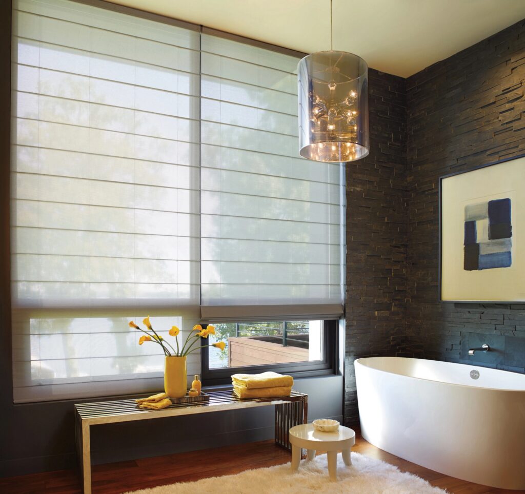 Hunter Douglas Alustra Woven Textures Roman Shades with Light Filtering fabric and Custom Clutch operating system for bathroom in Colorado home