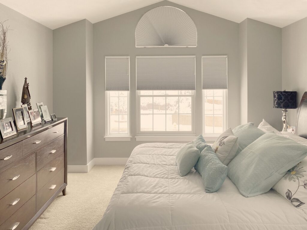 Hunter Douglas Applause Cellular Shades with UltraGlide operation, Non-Operable specialty shape design, and Room Darkening fabric