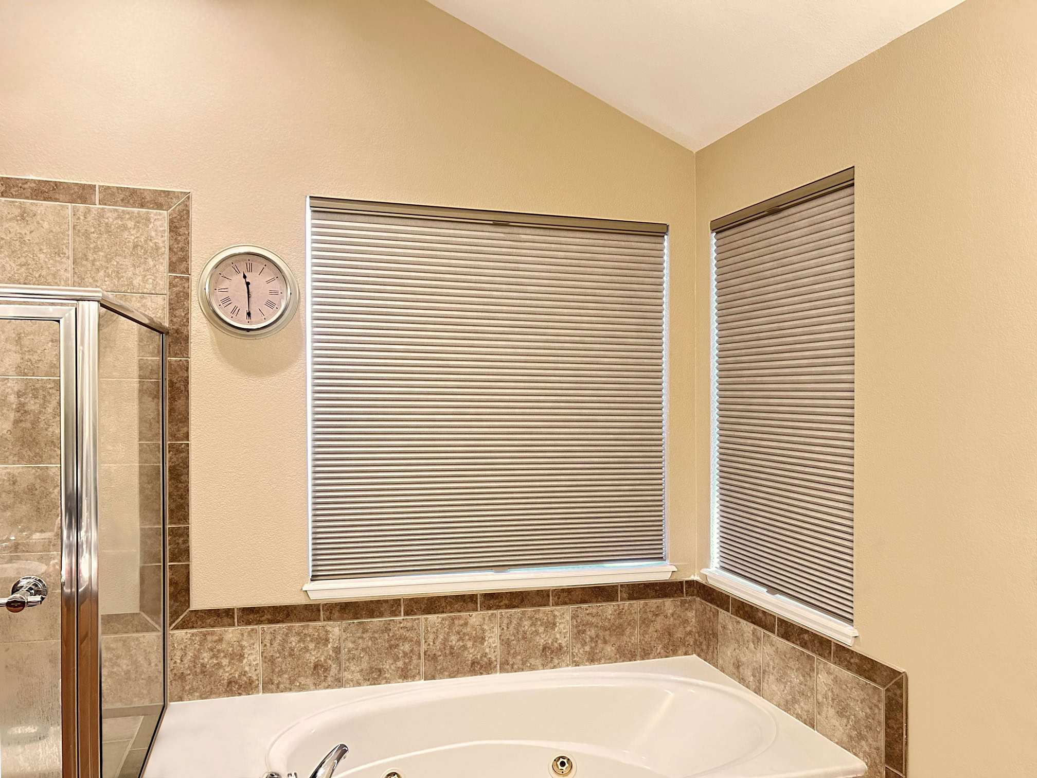 Hunter Douglas Applause Cellular Shades with LiteRise cordless operation, Top-Down Bottom Up design, and room darkening fabric.