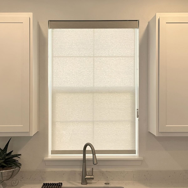 Hunter Douglas Designer Roller Shades with Custom Clutch and Light Filtering for kitchen in Colorado home