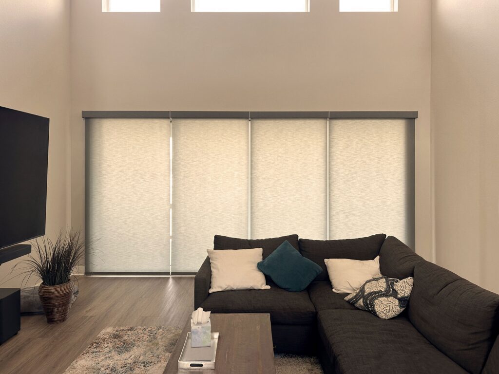 Hunter Douglas Designer Roller Shades with PowerView motorization and light filtering fabric. Installed in Castle Rock, CO Home.