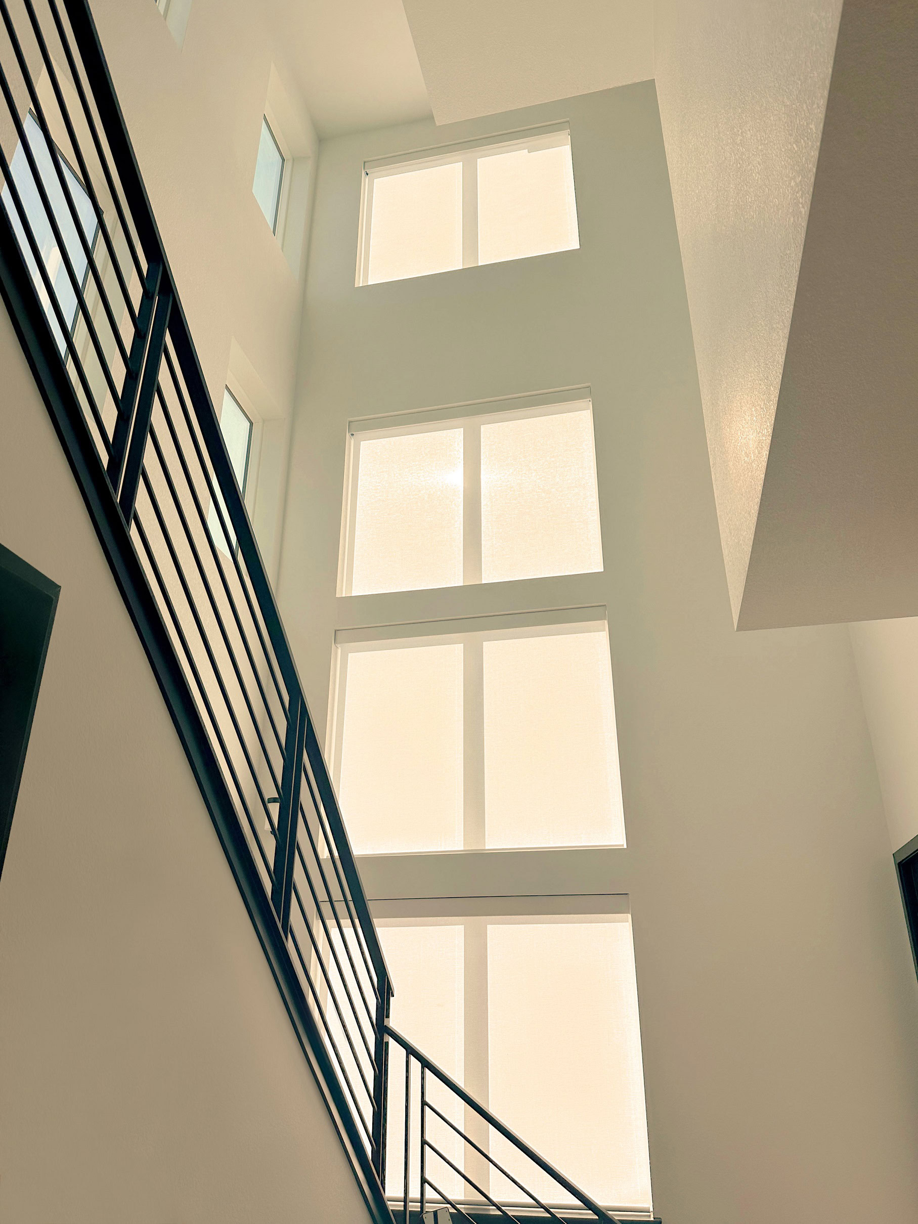 Hunter Douglas Designer Roller Shades with PowerView automation and light filtering fabric.