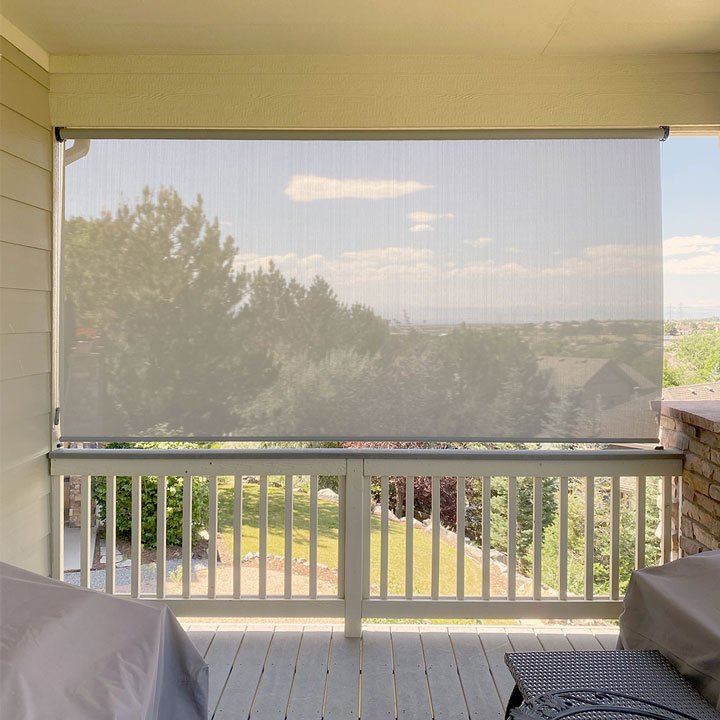 Hunter Douglas Designer Screen Shades with clutch operated control designed for patio applications