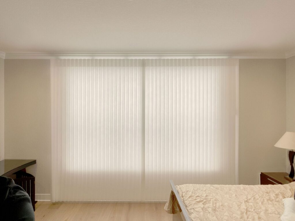 Hunter Douglas Luminette Privacy Sheers with wand control, split stack vertical design, and light filtering fabric for Colorado homes