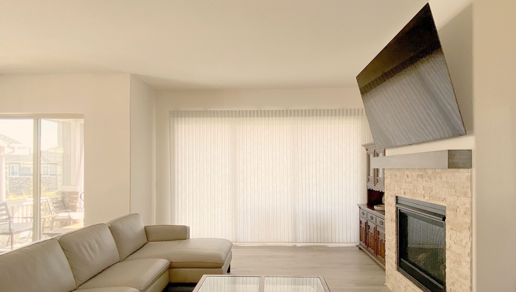 Hunter Douglas Luminette Privacy Sheers with PowerView Automation, right stack vertical operation, and light filtering fabric for Colorado home