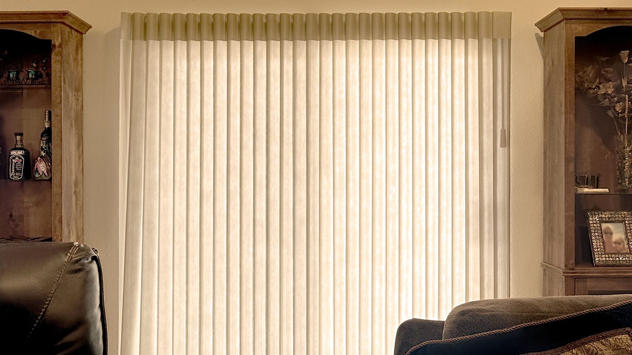 Hunter Douglas Luminette Privacy Sheers with wand control, left stack vertical operation, and light filtering fabric for Colorado home