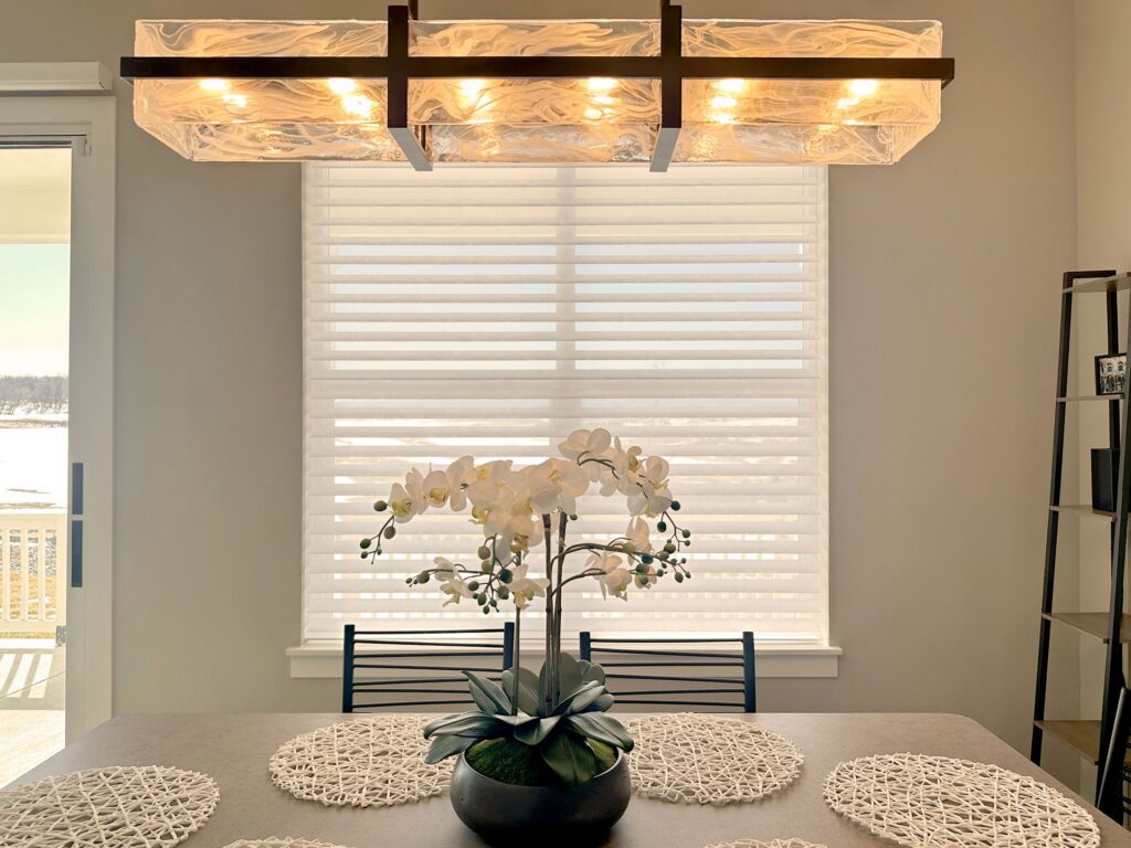 Hunter Douglas Nantucket Sheer Shades with Light Filtering fabric and PowerView motorized operation.