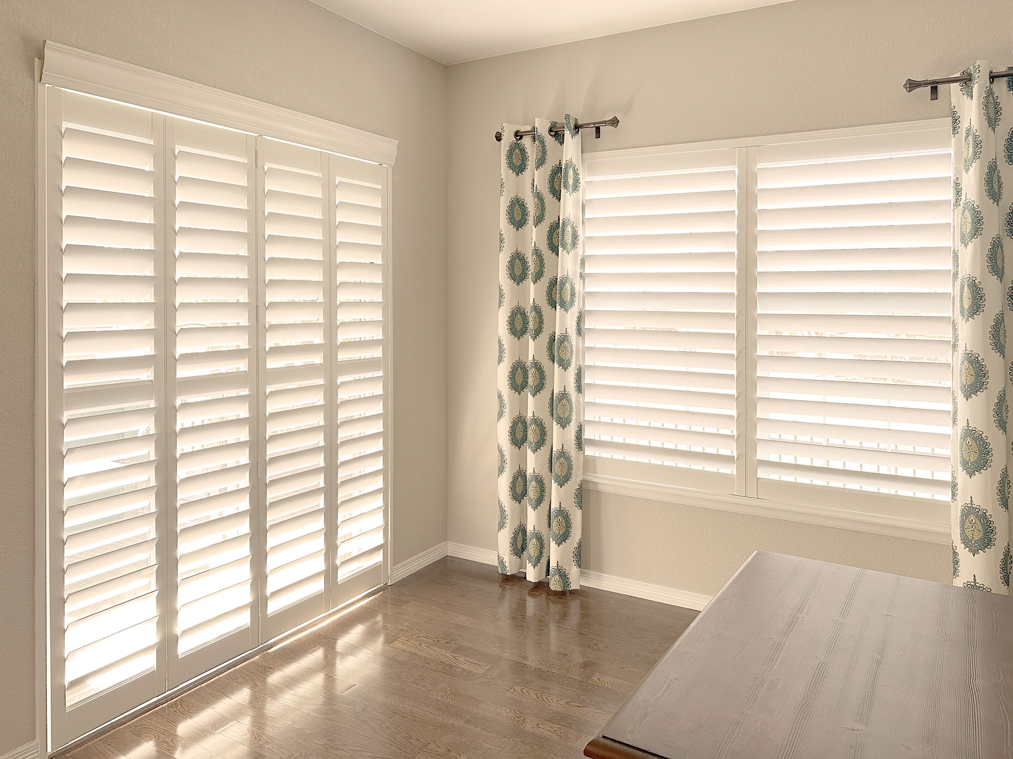 Hunter Douglas NewStyle Hybrid Shutters with Hidden Tilt, Bi-Fold Track system, and Z Frame