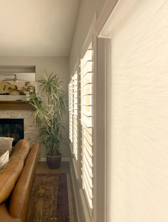 Hunter Douglas NewStyle Hybrid Shutters with Front Center Tilt operation in Aurora.