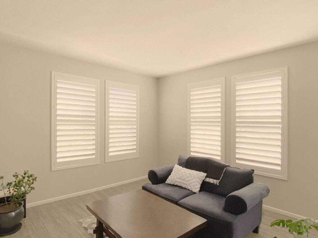 Hunter Douglas Palm Beach Polysatin Shutters with Hidden Tilt and Z Frame construction for Colorado living rooms